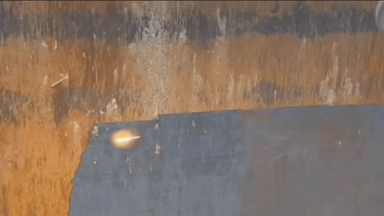 Laser cleaning rust from metal surface