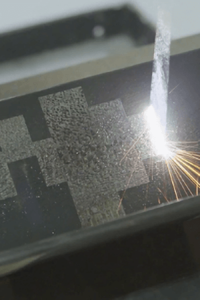 Laser cleaning of coating on metal surface